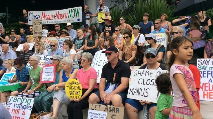 Supporters of the hospital's decision not to release a baby girl back to detention have gathered outside.  Photo: Lisa Yallamas