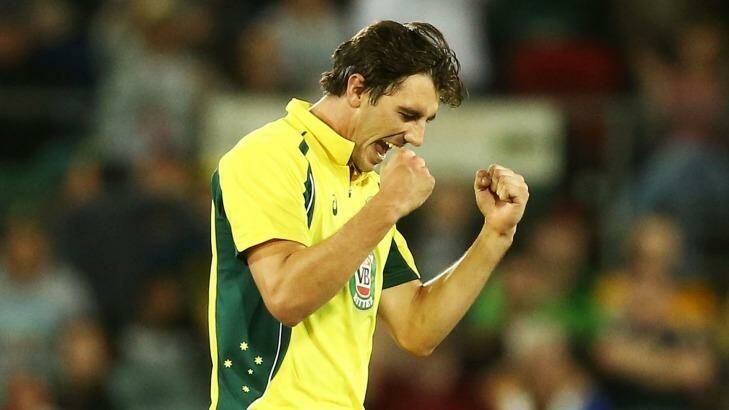 Pat's back: Pat Cummins celebrates one of his four wickets in Canberra. Photo: Mark Metcalfe