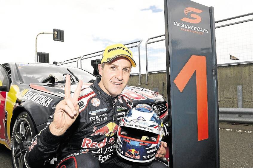Jamie Whincup  celebrates after winning at Symmons Plains.
