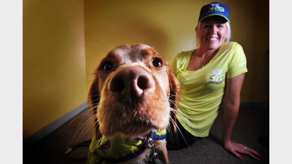 RSPCA's Hayley Stepchuk and Rusty will enjoy the Million Paws Walk again this year. Picture: SCOTT GELSTON