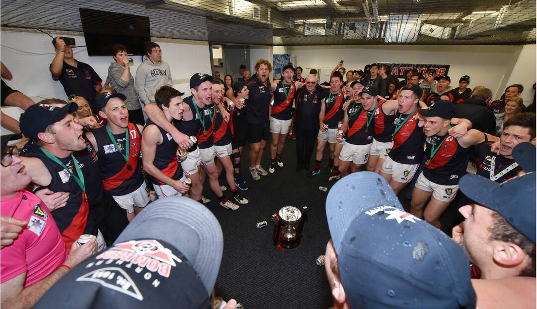 A loud round of the Bombers' team song. Picture: SCOTT GELSTON