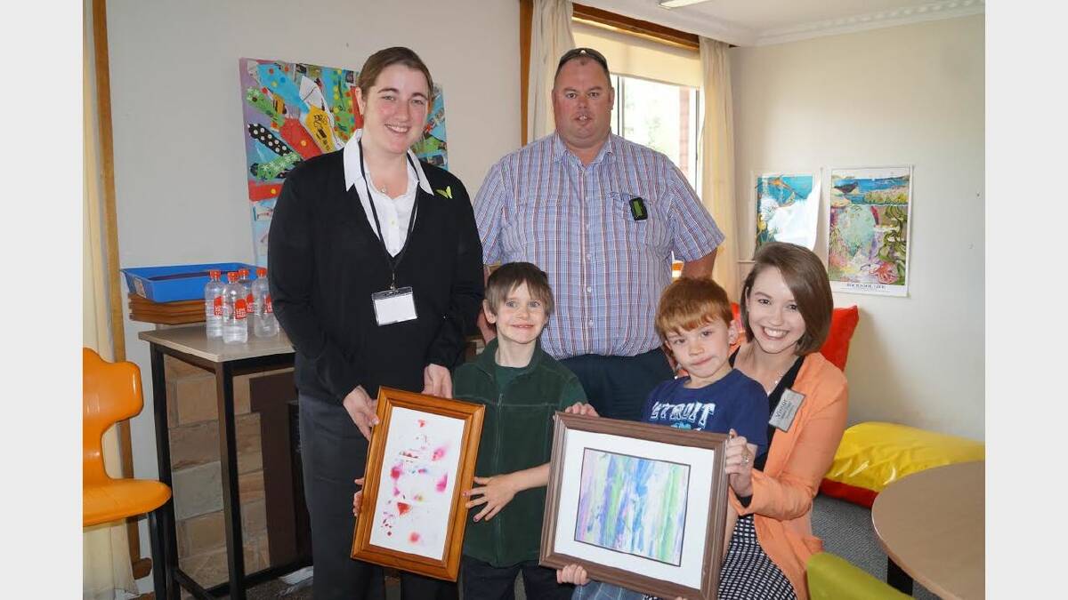 Foundation 33 treasurer Lisa Phipps, pupil Logan, principal Tim Chugg, pupil Blake, Foundation 33 president Renee Bowyer-Bower at the presentation of funds raised for education costs at Giant Steps.