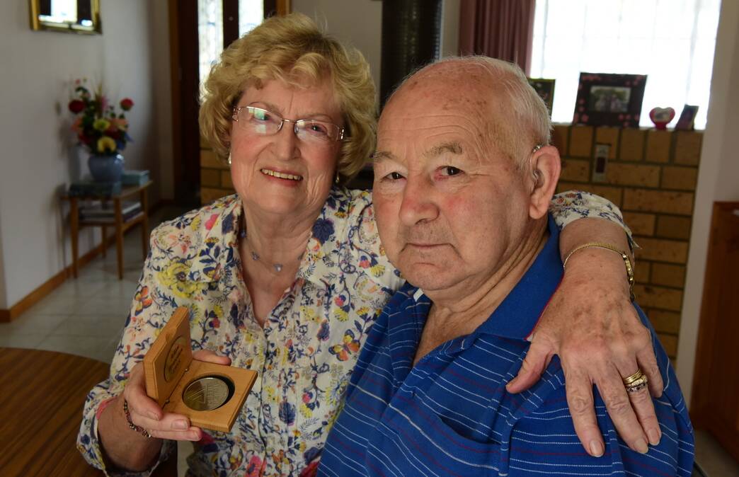 Kaye Bransden with the award that recognises husband Allan's 60 years of living with diabetes. Picture: PAUL SCAMBLER