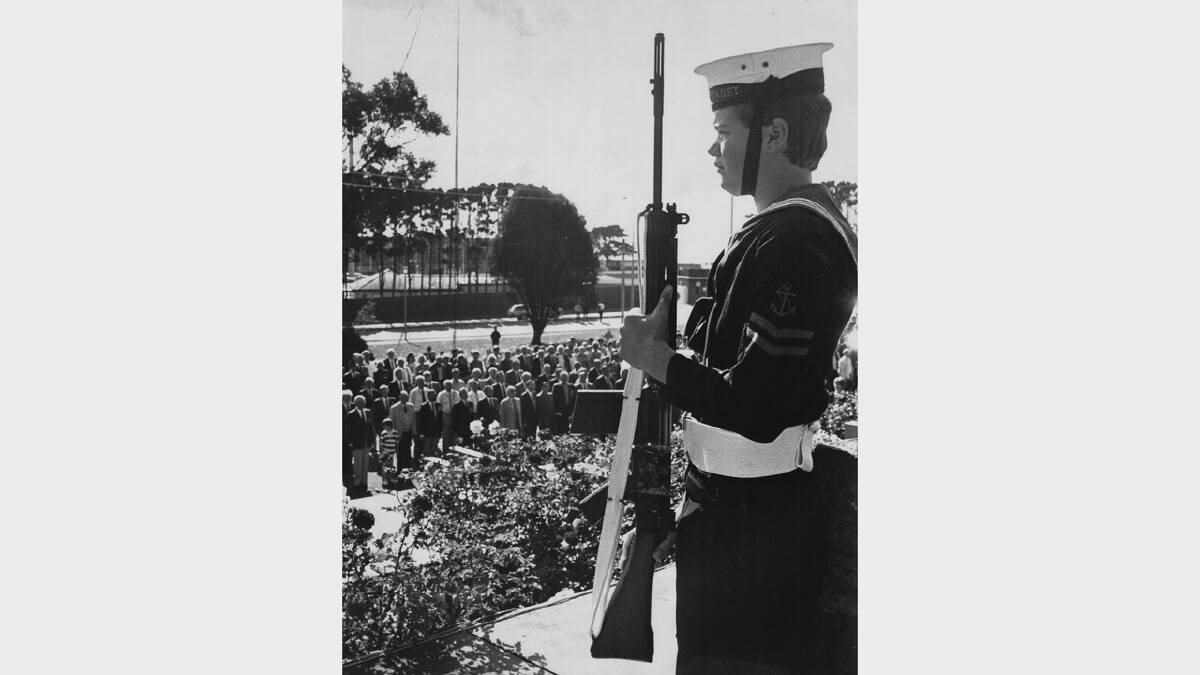 Anzac Day flashback gallery | Naval Reserve cadet Justin Quinn forms part of the guard of honour at the Burnie Cenotaph in 1988.