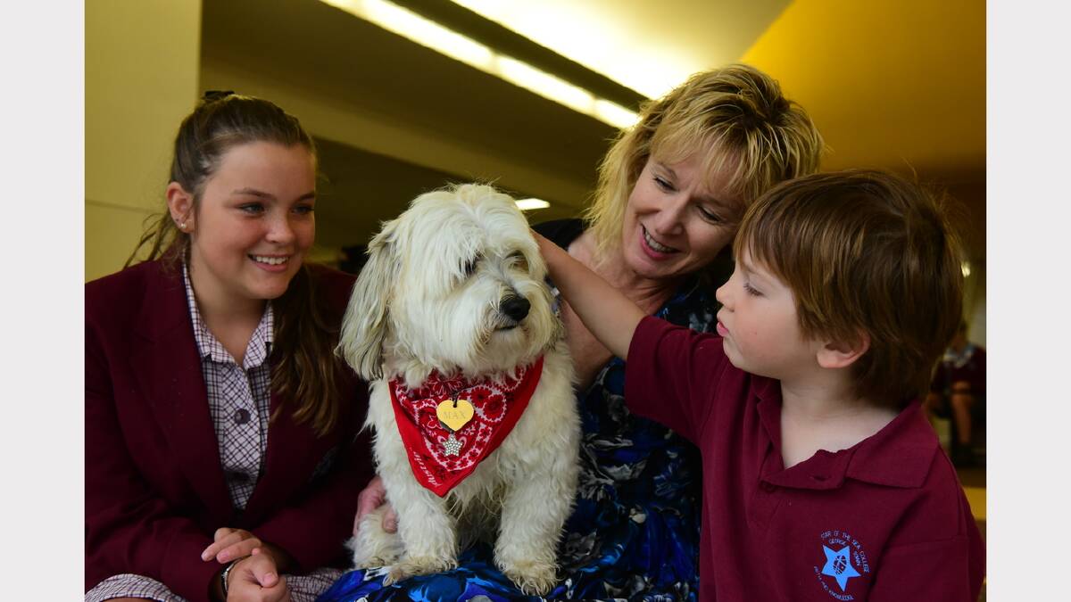 Tayla Sands, 13,  with Denice Milburn and Jaxsyn Pollock, 4, with Max. Picture: Paul Scambler
