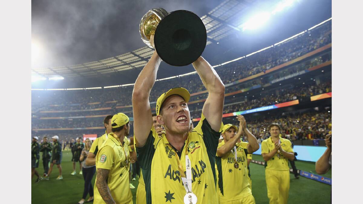 Launceston's James Faulkner celebrates after Australia wins the World Cup. Picture: GETTY IMAGES