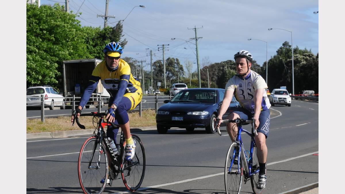 The Examiner's Alex Druce and Cycling Tasmania's Colin Burns ride along the West Tamar Highway. Picture: Paul Scambler