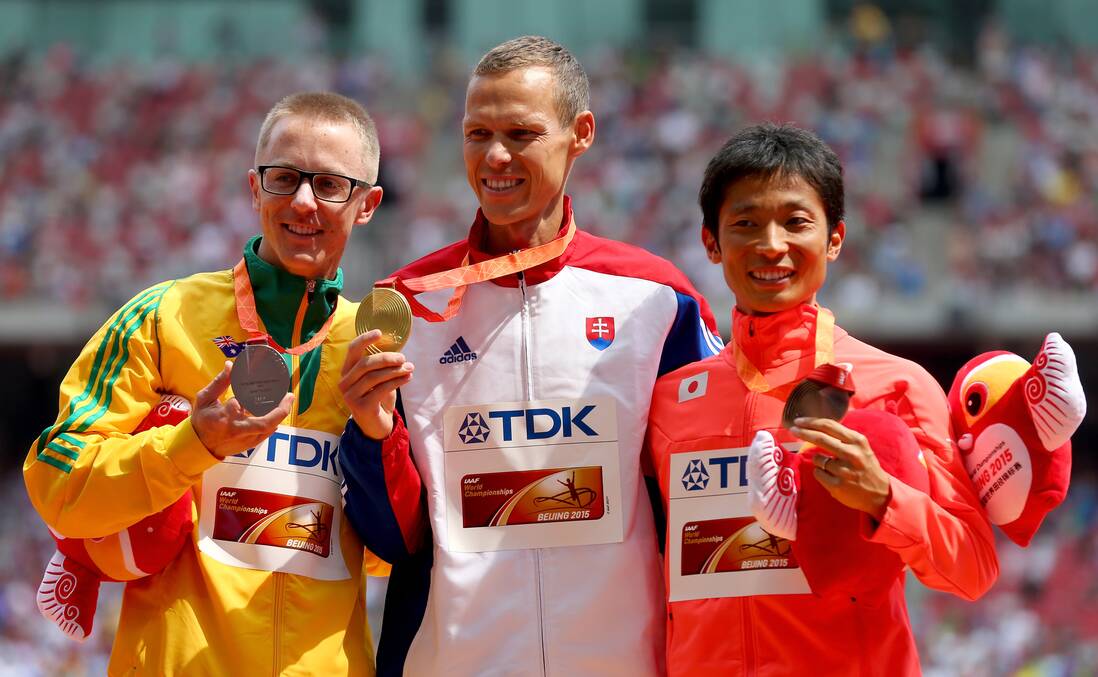 Silver medalist Jared Tallent of Australia, gold medalist Sergey Kirdyapkin of Russia and bronze medalist Tianfeng Si of China pose during the medal ceremony for the Men's 50km Walk on Day 15 of the London 2012 Olympic Games. Picture: GETTY IMAGES