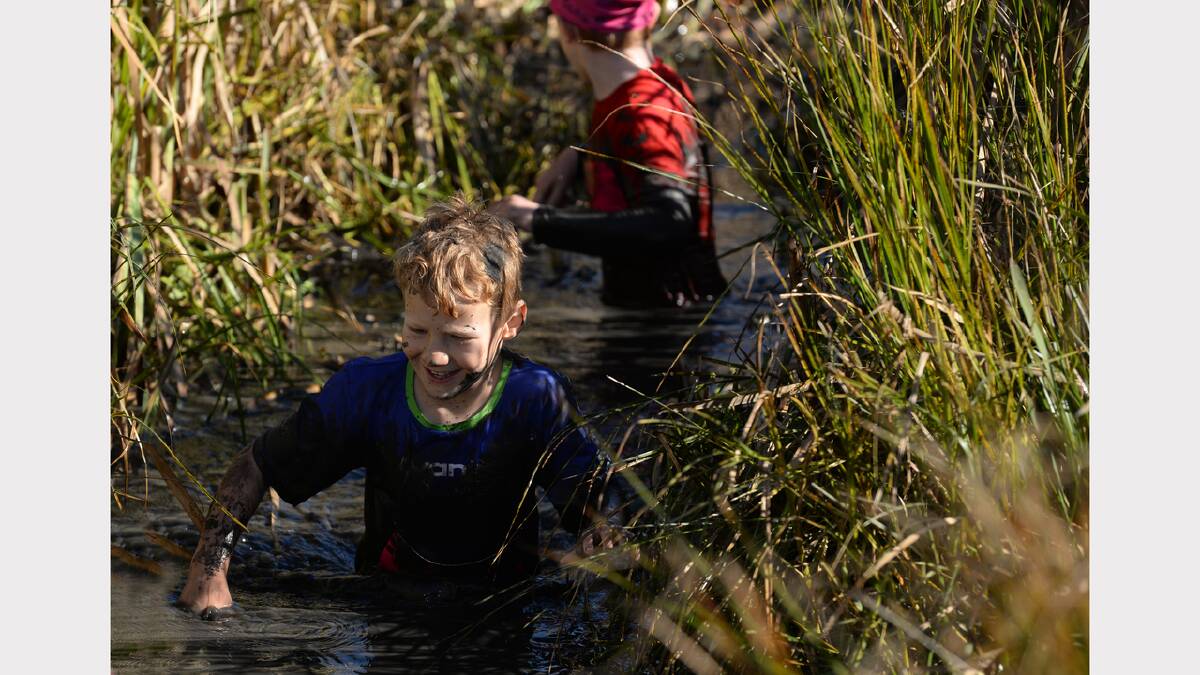 More than 800 people got down and dirty for the annual Tas Mud Run, held at Van Dieman Brewing at Evandale. Picture: Mark Jesser