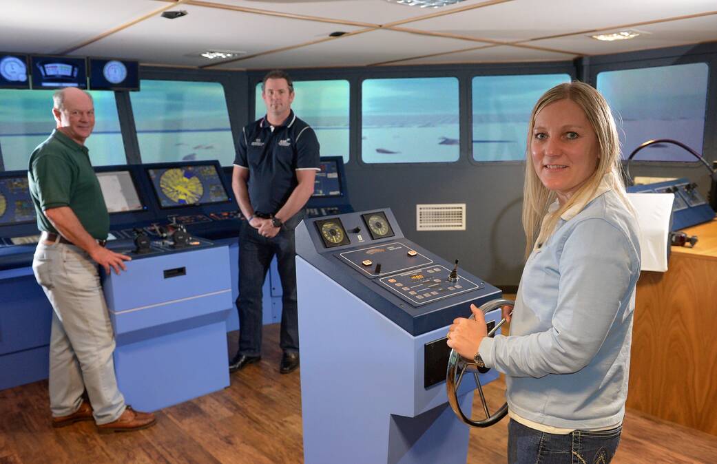 Aurora Australis captain Murray Doyle, simulator developer Paul Brown and third officer Katrina Beams in the AMC ice breaker simulator. Picture: PHILLIP BIGGS