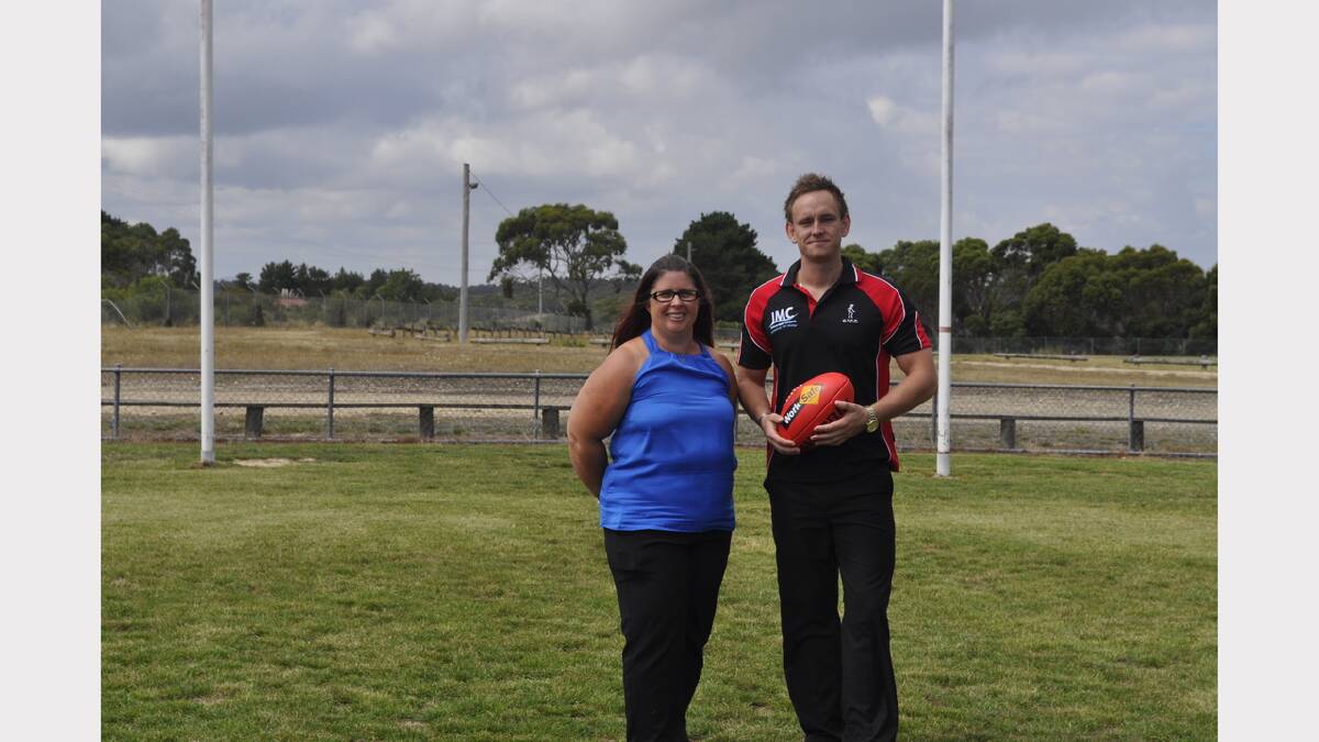 Doing Life Together co-ordinator Tammy McLean and George Town Football Club vice-president Adam Walker discussing Sunday's event.