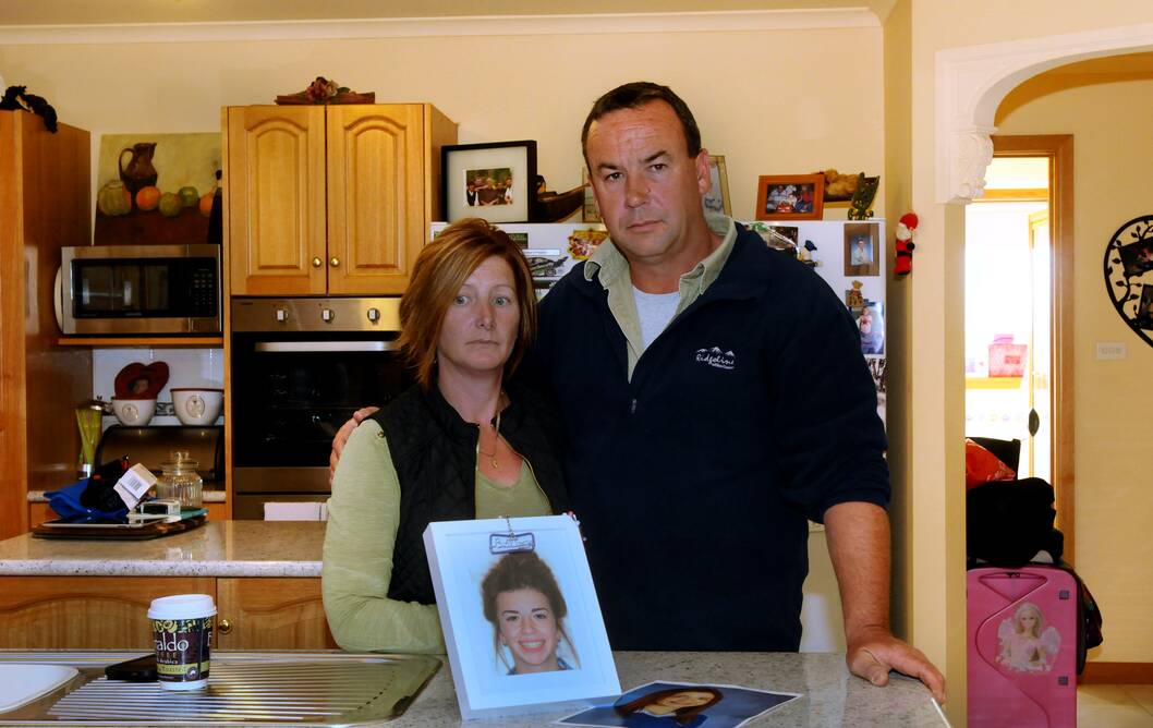Lisa and Peter Goss with a photo of their daughter Brittany, who was killed in an accident on the West Tamar Highway. Picture: Neil Richardson