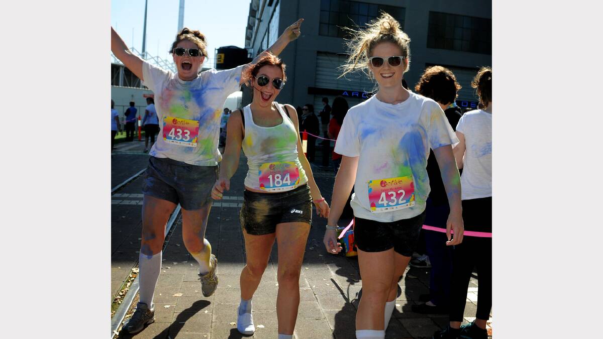 Hannah Adams, Lucy Quon and Mikayla Raseta-Lee were up bright and early for the Colour Me Active Fun Run at Inveresk. Picture: Geoff Robson