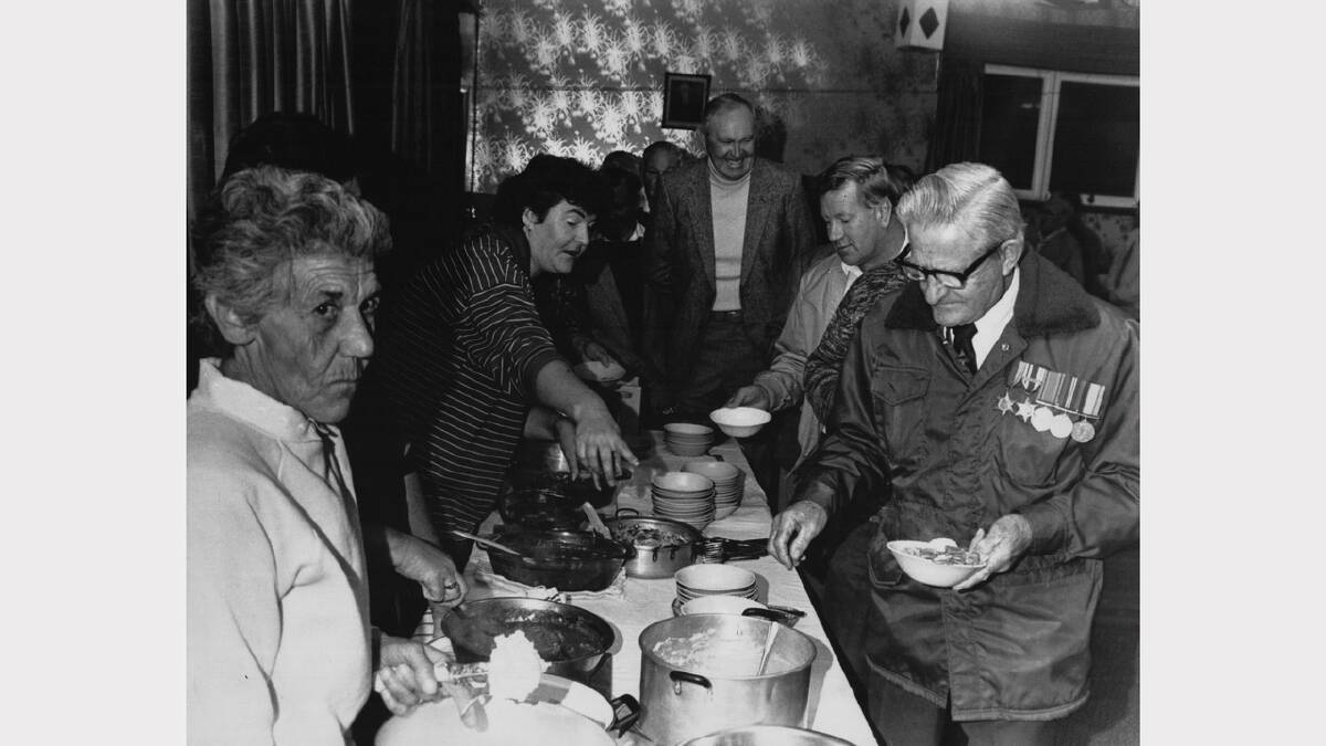 Anzac Day flashback gallery | Ex-servicemen line up for a post-dawn service breakfast at Latrobe, 1988.
