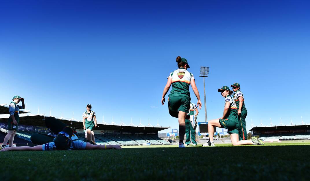 The Tasmanian Roar check out the playing surface at Aurora Stadium. Picture: Scott Gelston
