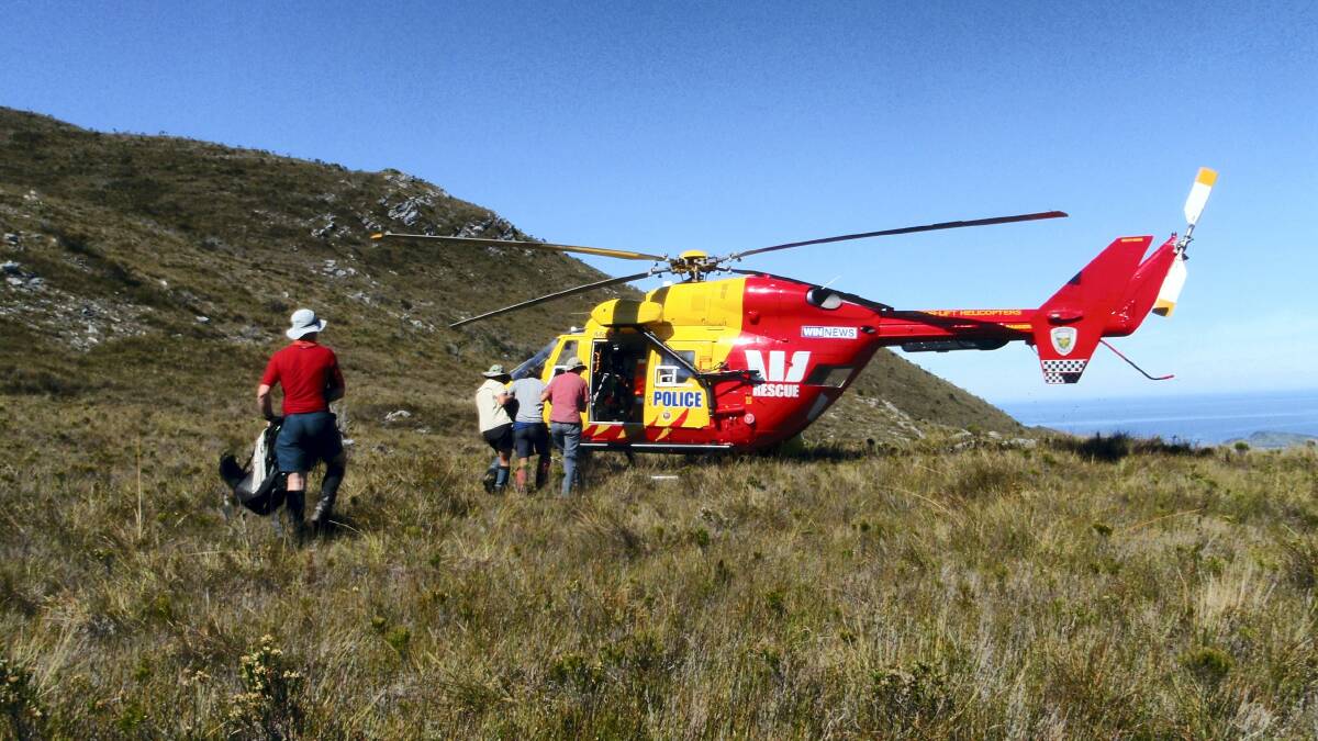 Two men rescued by chopper