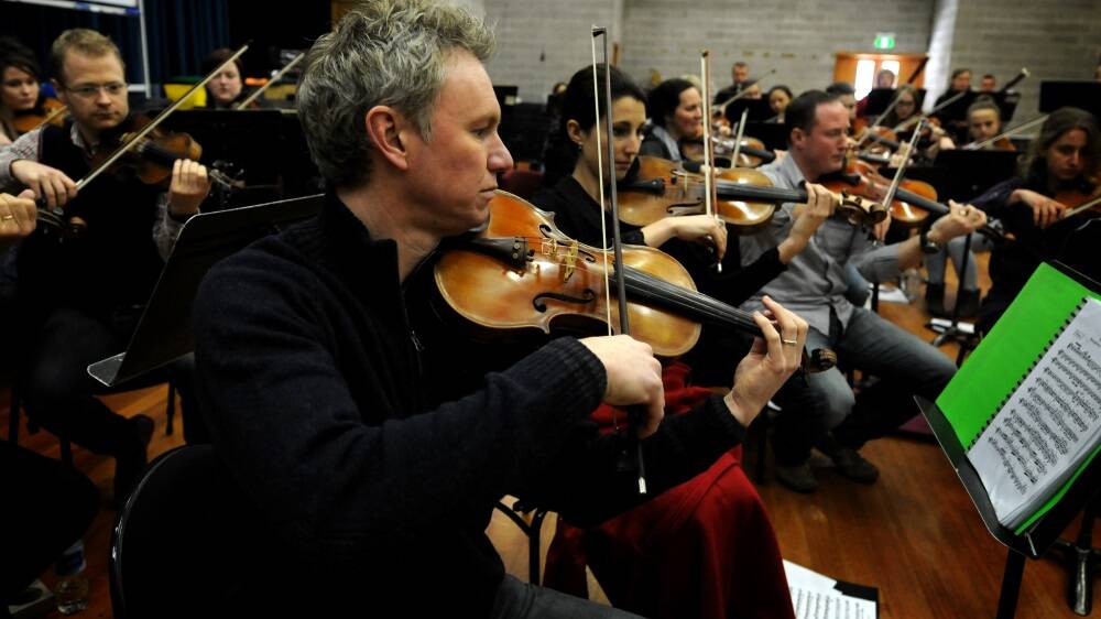 Launceston Philharmonic Orchestra concert master Michael Stocks at yesterday's concert rehearsal. Picture: Geoff Robson
