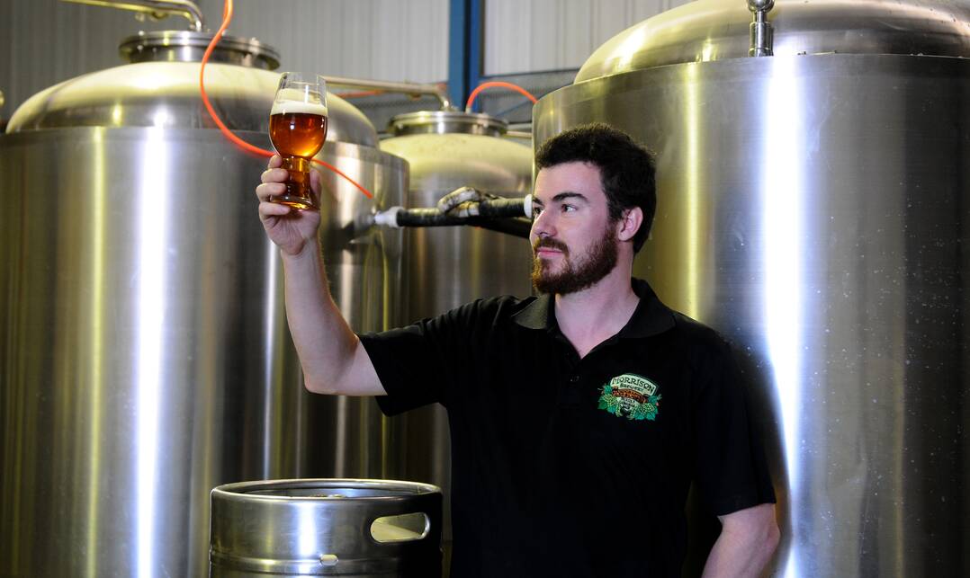 Paul Morrison at Morrison Brewery with his Smoked Chilli IPA. Picture: NEIL RICHARDSON