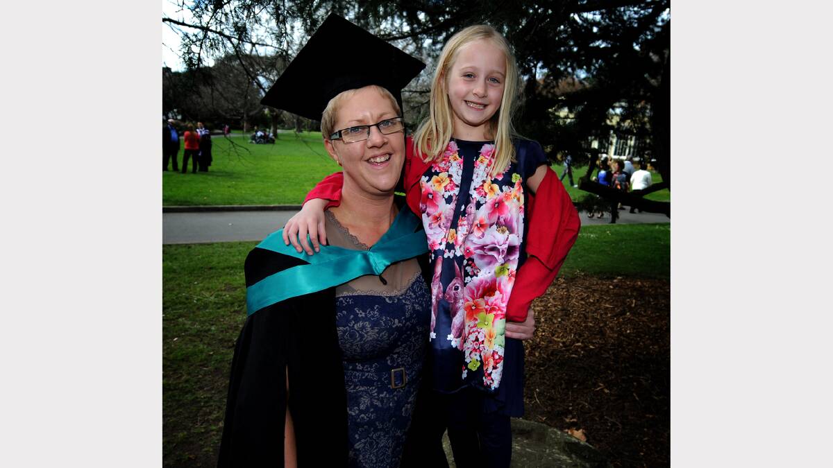 Sarah and Freya Pickrill, of George Town, celebrate in City Park. Picture: Geoff Robson