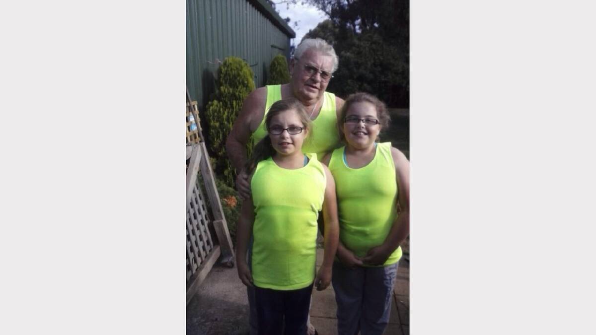 'My dad Gordon, encouraging his granddaughters Paige and Nikki into his fluoro obsession'. Sent in by Tynaha