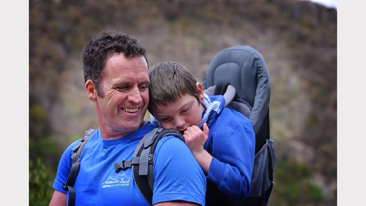 Chris Duffy and his son Jack, 8, plan to walk the Overland Track next month to raise money for Life Without Barriers. Picture: SCOTT GELSTON
