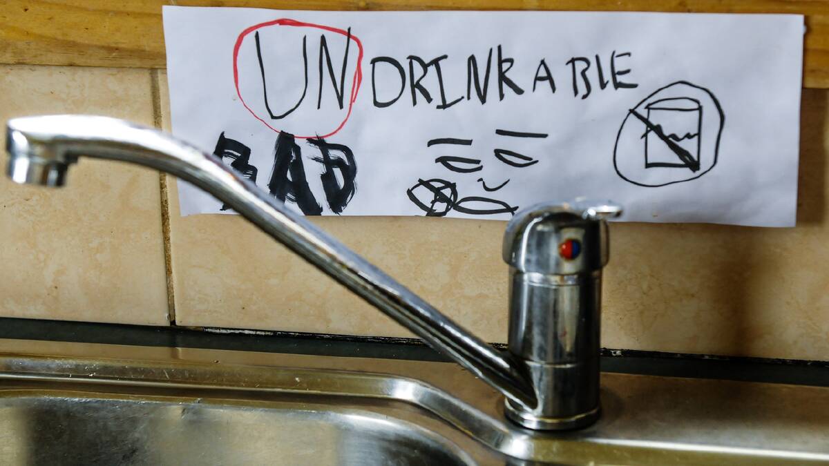 A warning sign not to drink water in a Winnaleah home. Picture: NEIL RICHARDSON