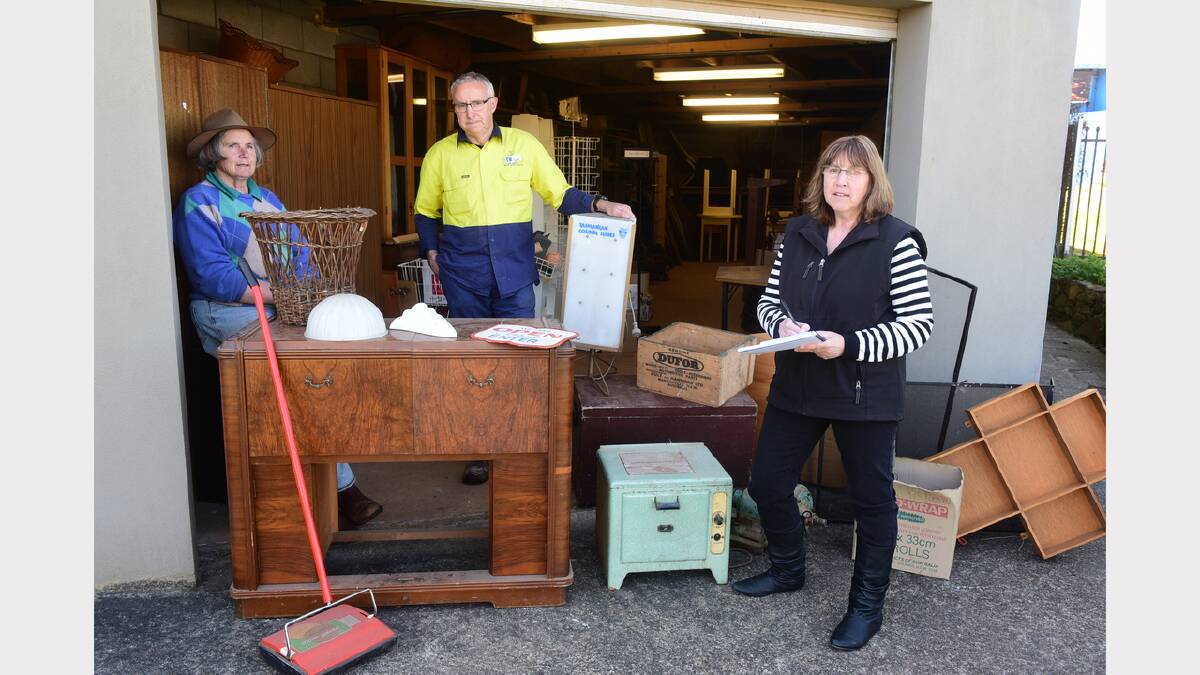 Deloraine and Districts Folk Museum volunteers Susan Bowman, Roger Nutting and Janice Poulton prepare for the garage sale. Picture: PAUL SCAMBLER

