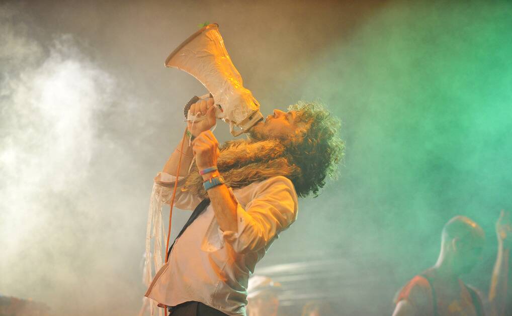 Wayne Coyne leads The Flaming Lips through a set at the 2011 Harvest festival.