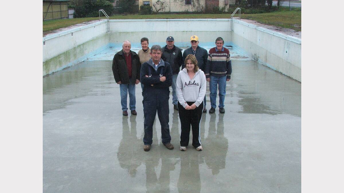 The Ringarooma Pool Committee, pictured in 2007 after it received a $33,000 grant to upgrade the pool.