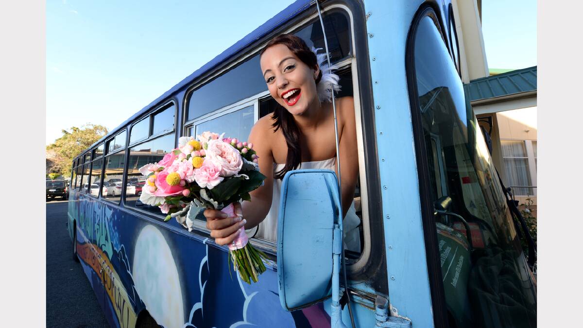 Sara Slater ditches the Launceston Bridal Expo for a ride on the Fun Bus. Picture: Mark Jesser