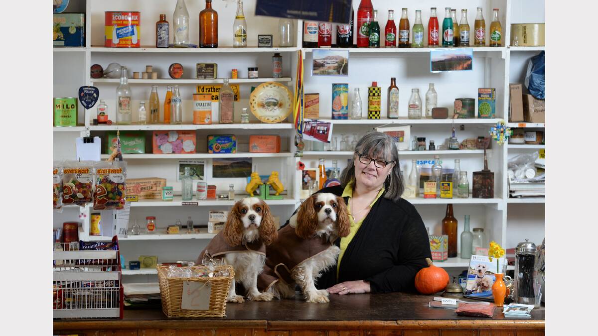 Barrington General Store owner Penny Lane with her two companions ... the store is closing down. Picture: MARK JESSER
