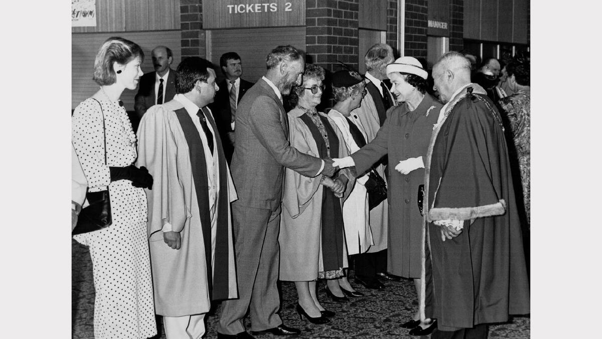 Queen Elizabeth and Prince Philip's 1988 royal visit | Mr Kingston, husband of alderman Mrs Julie Kingston, greets the Queen as one of the officially invited guests at the Burnie Civic Centre.