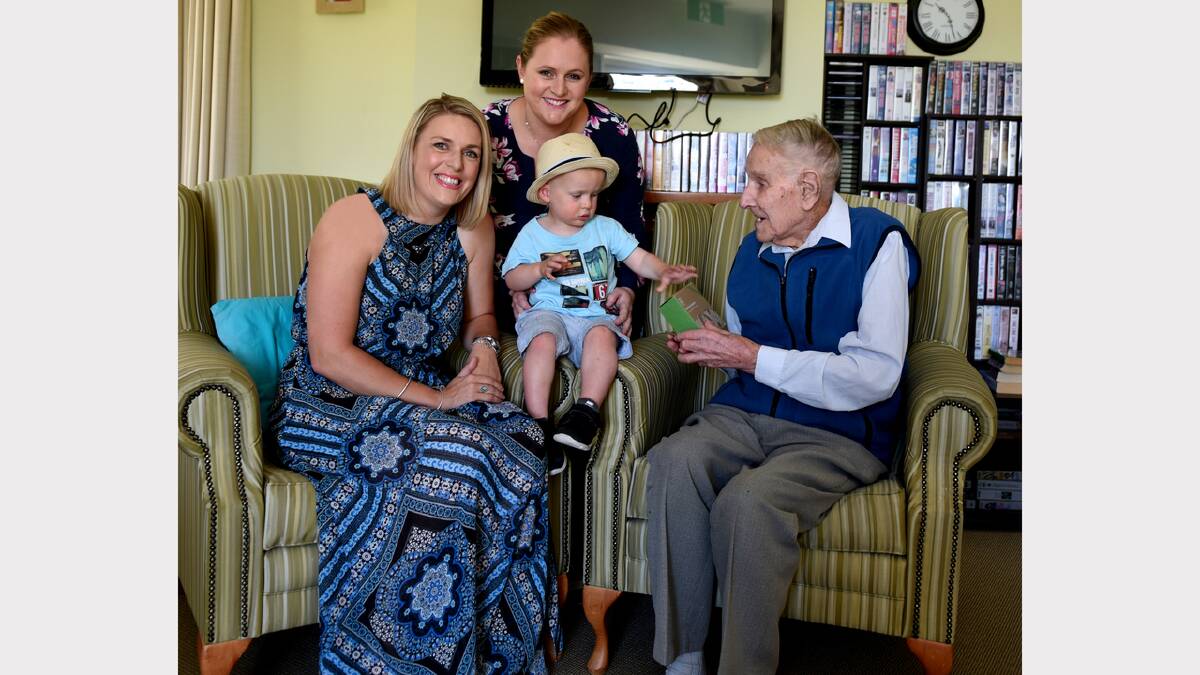 Adopt A Grandparent co-founder Danielle Seadon with Emma Matthews, her son Leo, 2, and Presbyterian Care Legana resident Arthur ‘‘Slim’’ Miles. Picture: NEIL RICHARDSON