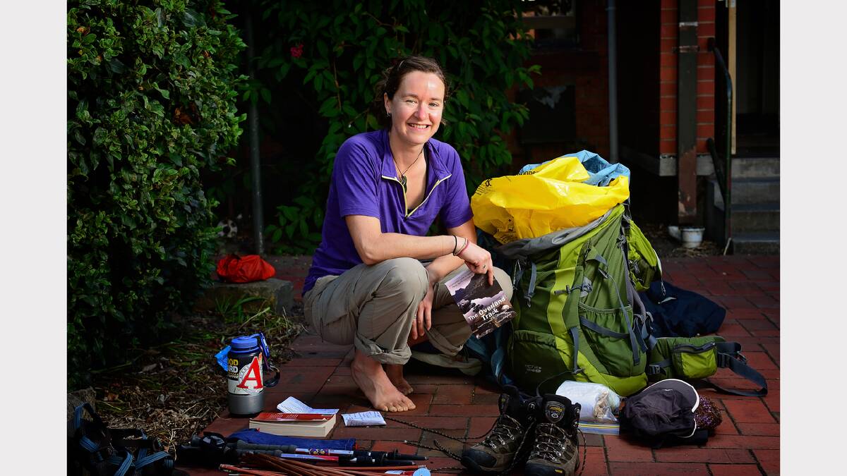 Susan Monroe, of Utah in the US, packing to hitch-hike to the Walls of Jerusalem. Picture: Phillip Biggs