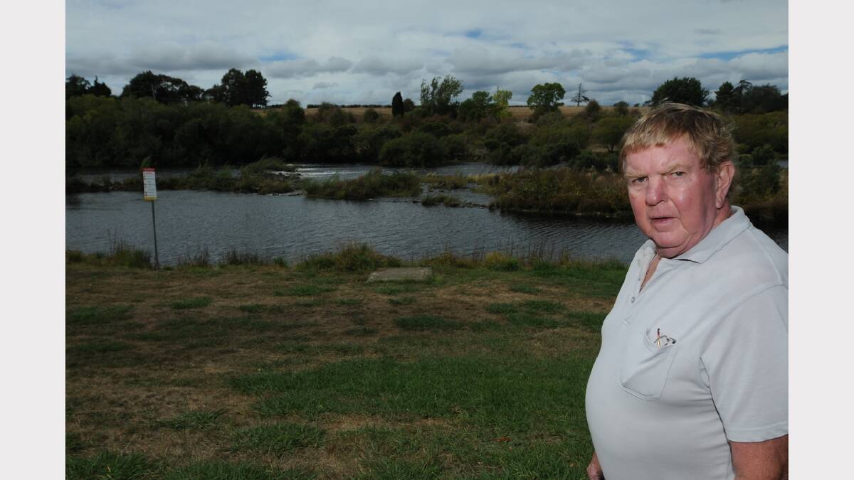 Perth resident John Stagg is concerned that the town may lose its oldest feature — a South Esk River dam by the Midland Highway bridge.