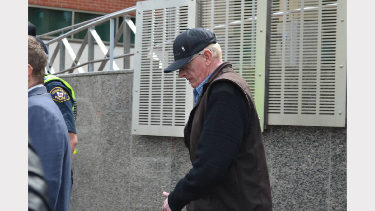 Geoffrey Charles Hunt leaves court in Hobart.