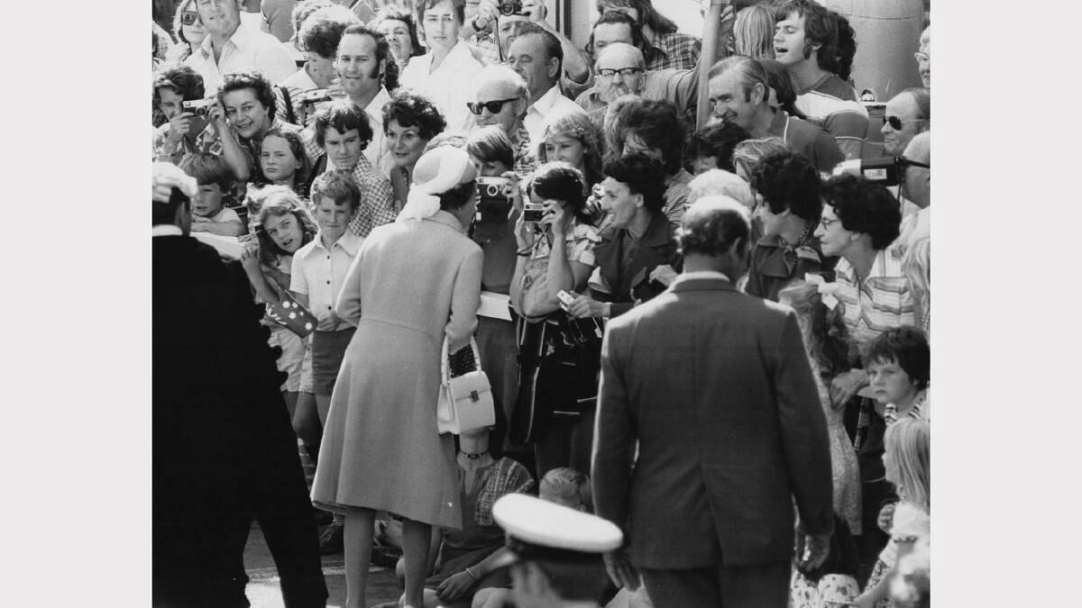 Queen Elizabeth and Prince Philip's 1977 royal visit | The Queen stops during to chat during her walk of St John Street.