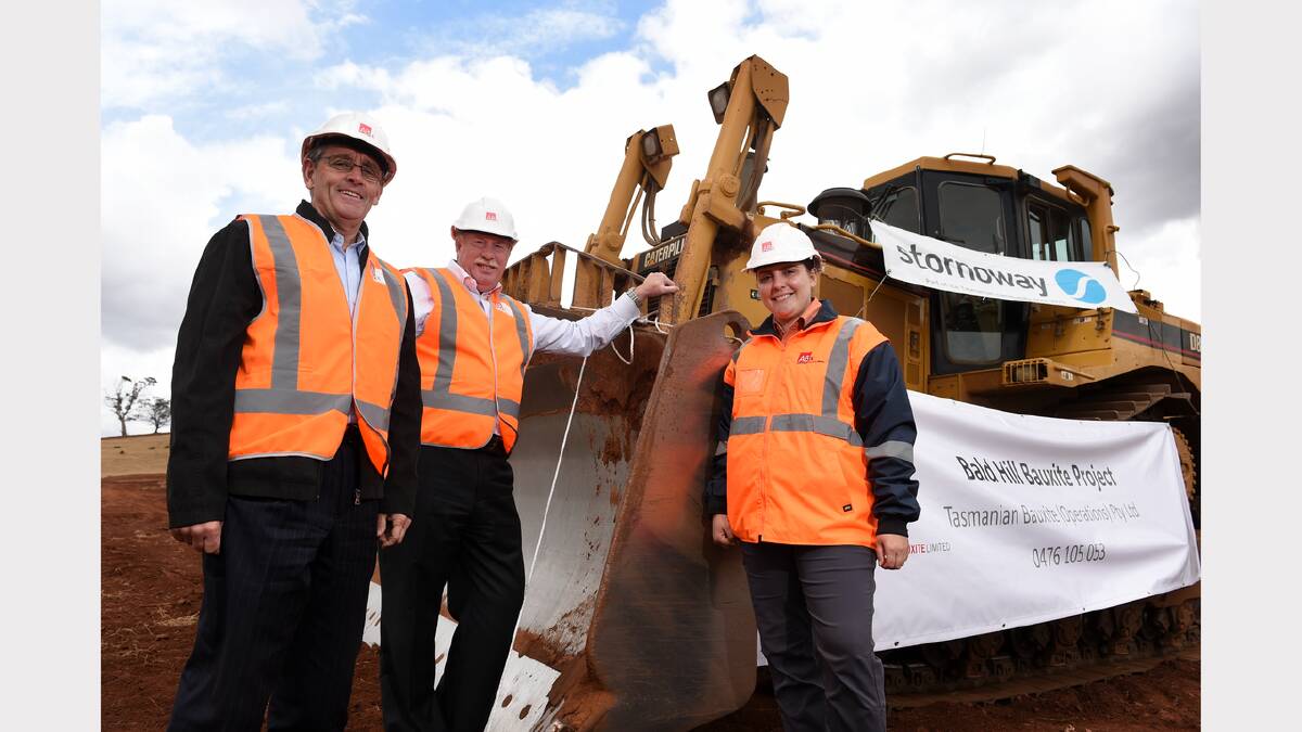 Resources Minister Paul Harriss, Bauxite Chairman Paul Lennon and Bauxite Project Geologist Tamara Coyte at the opening of the Campbell Town mine in December.