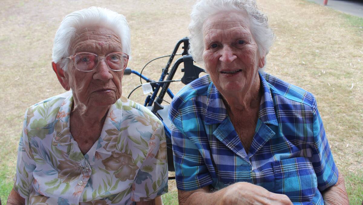 Joyce Connors and Edna Hockey of Beaudesert enjoyed a cuppa before the Glad's Girls drought fundraiser concert.