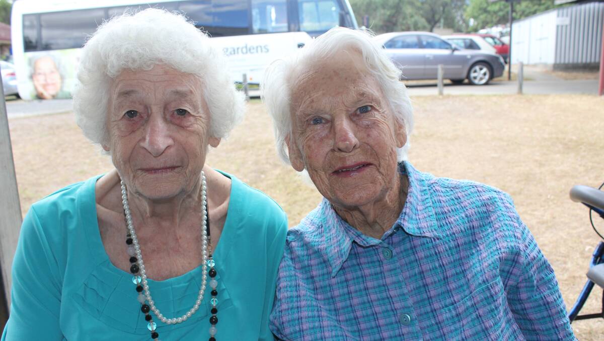 Beaudesert women Connie Thompson and Dorothy Nicol caught up at the Glad's Girls drought fundraiser.
