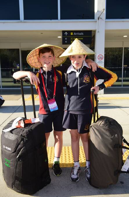 Connor O'Sign, 11, and Dominic Mace, 12, Grade 6 students from Scotch Oakburn College, return from China. Picture: PAUL SCAMBLER