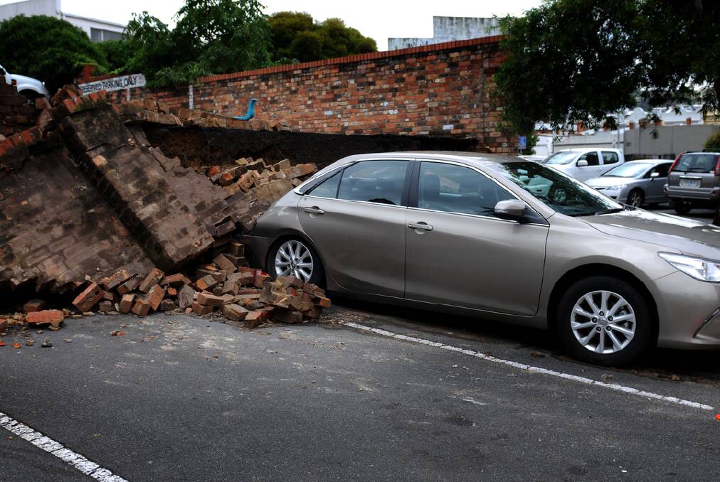 Damage caused to a car at the Best Western Hotel in Launceston, following Thursday night's storm. Picture: GEOFF ROBSON
