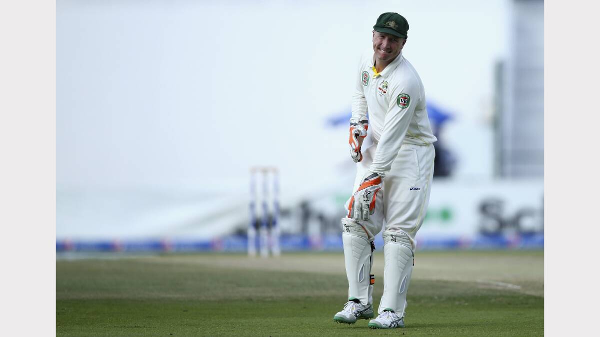 Brad Haddin in obvious discomfort yesterday. Picture: Getty Images.