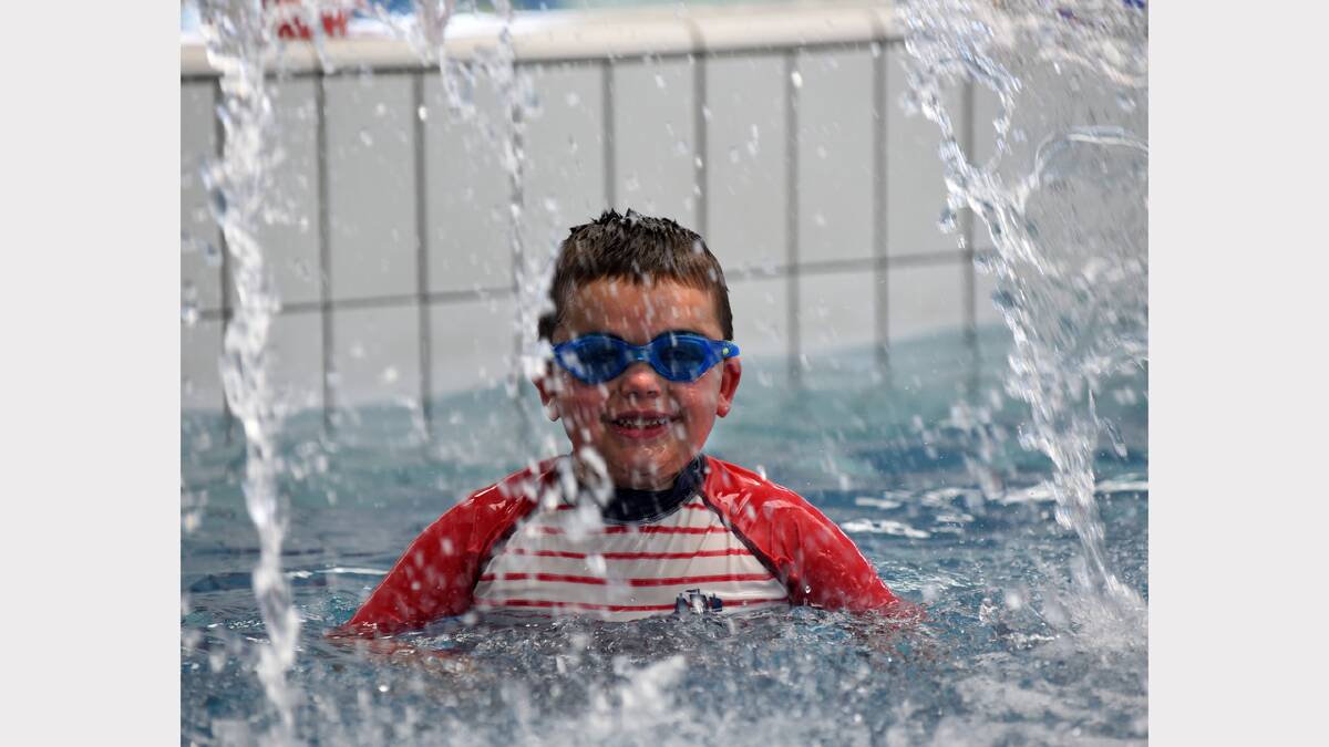 Nixon Coombes, 4, of Launceston enjoys a swim before his swimming lesson at Launceston Aquatic Centre. Picture: NEIL RICHARDSON