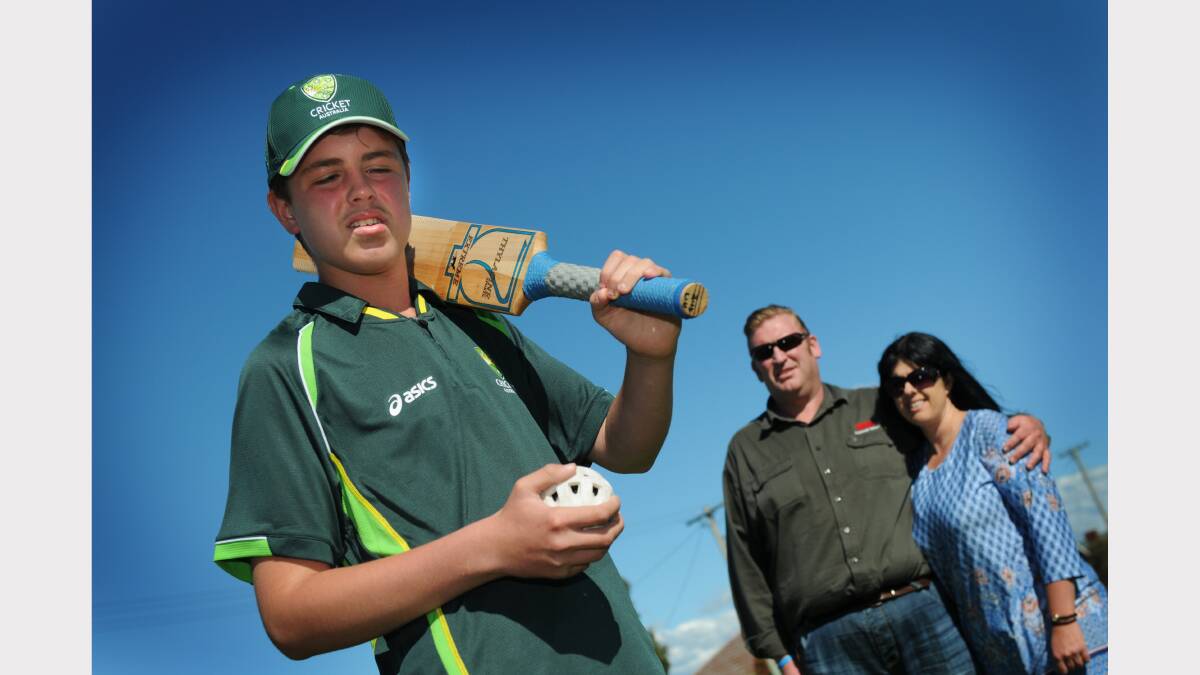 Blind cricketer Callum Harper, 13, of Mowbray, with his parents Andrew and Amanda Harper. Callum is set to become the first Tasmanian to represent his country in a visually impaired cricket side. Picture: PAUL SCAMBLER