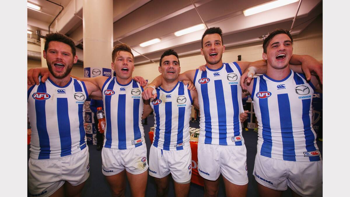 North Melbourne players celebrate last week's win over Carlton. Picture: Getty Images. 