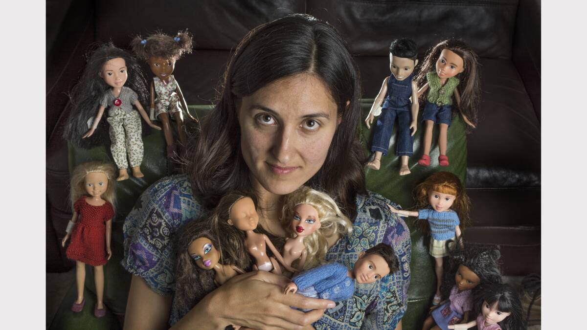 Sonia Singh with some of the dolls she has de-glamourised. Photo: Michael Rayner.