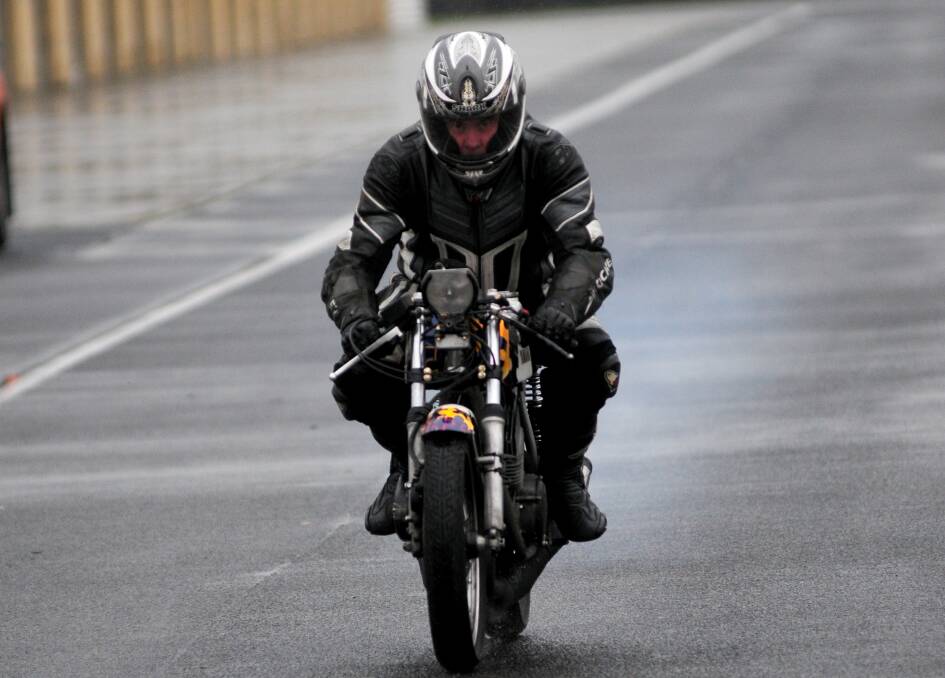 Michael Dobson, of Riverside, heads out for another few laps during yesterday's rain-affected Tasmanian Motor Cycle Club ride day at Symmons Plains. Picture: Peter Sanders.
