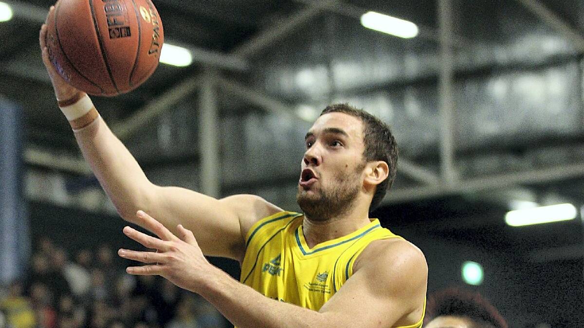  Tasmanian Adam Gibson has been in action for the Boomers.
