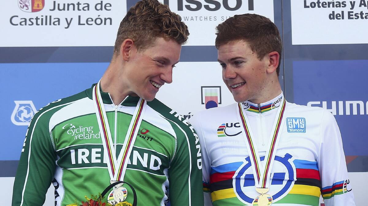Ryan Mullen (2nd), of Ireland, chats to race winner Campbell Flakemore  on the podium for the under-23 men’s individual time trial.   Picture: GETTY IMAGES